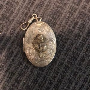 Antique silver rose locket